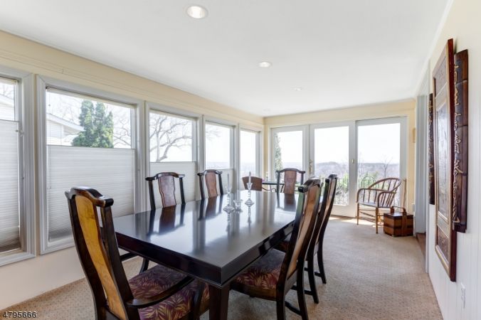 Den used as dining room